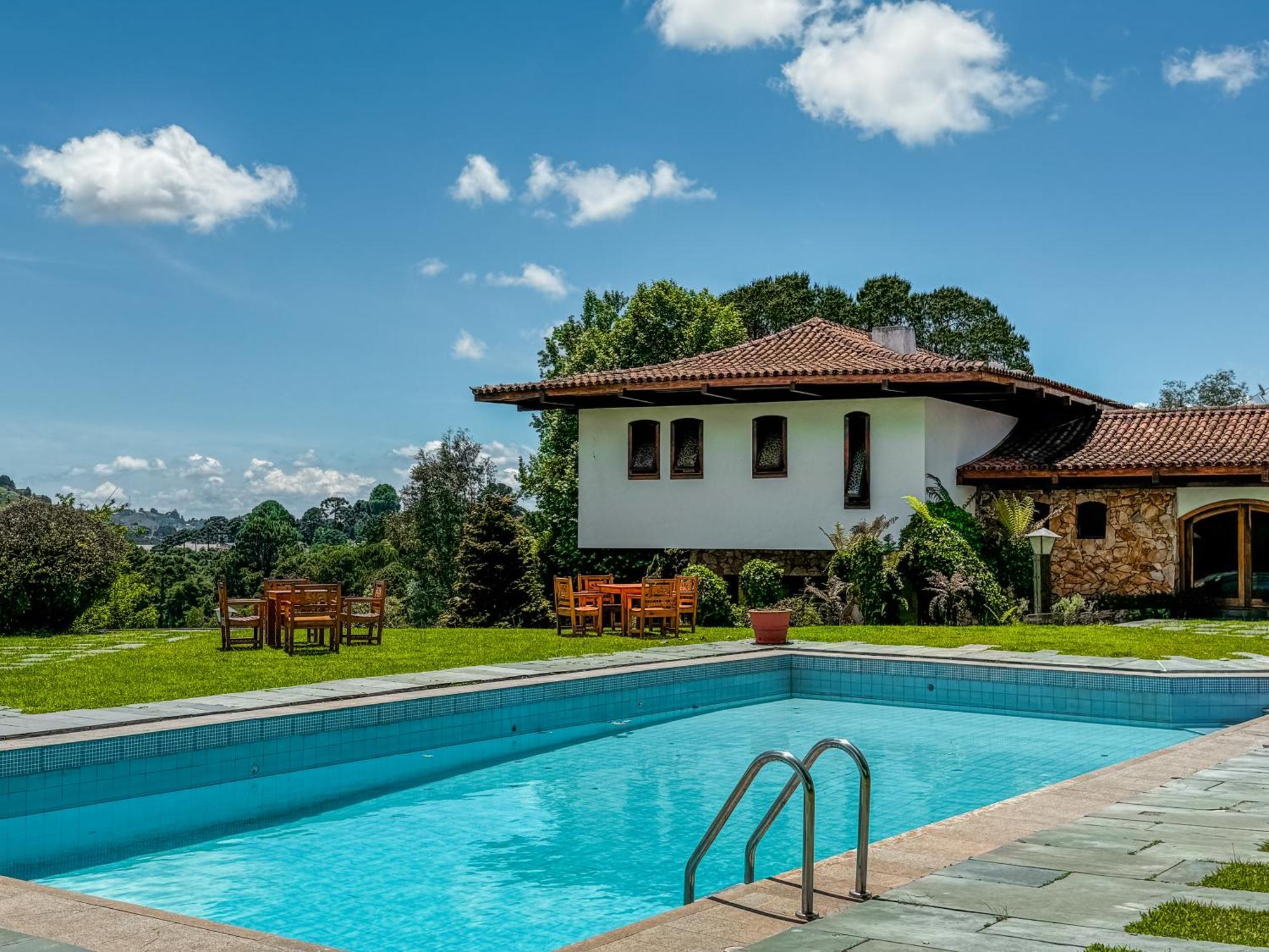 Mansao Nacional Inn Кампус-ду-Жордау Экстерьер фото