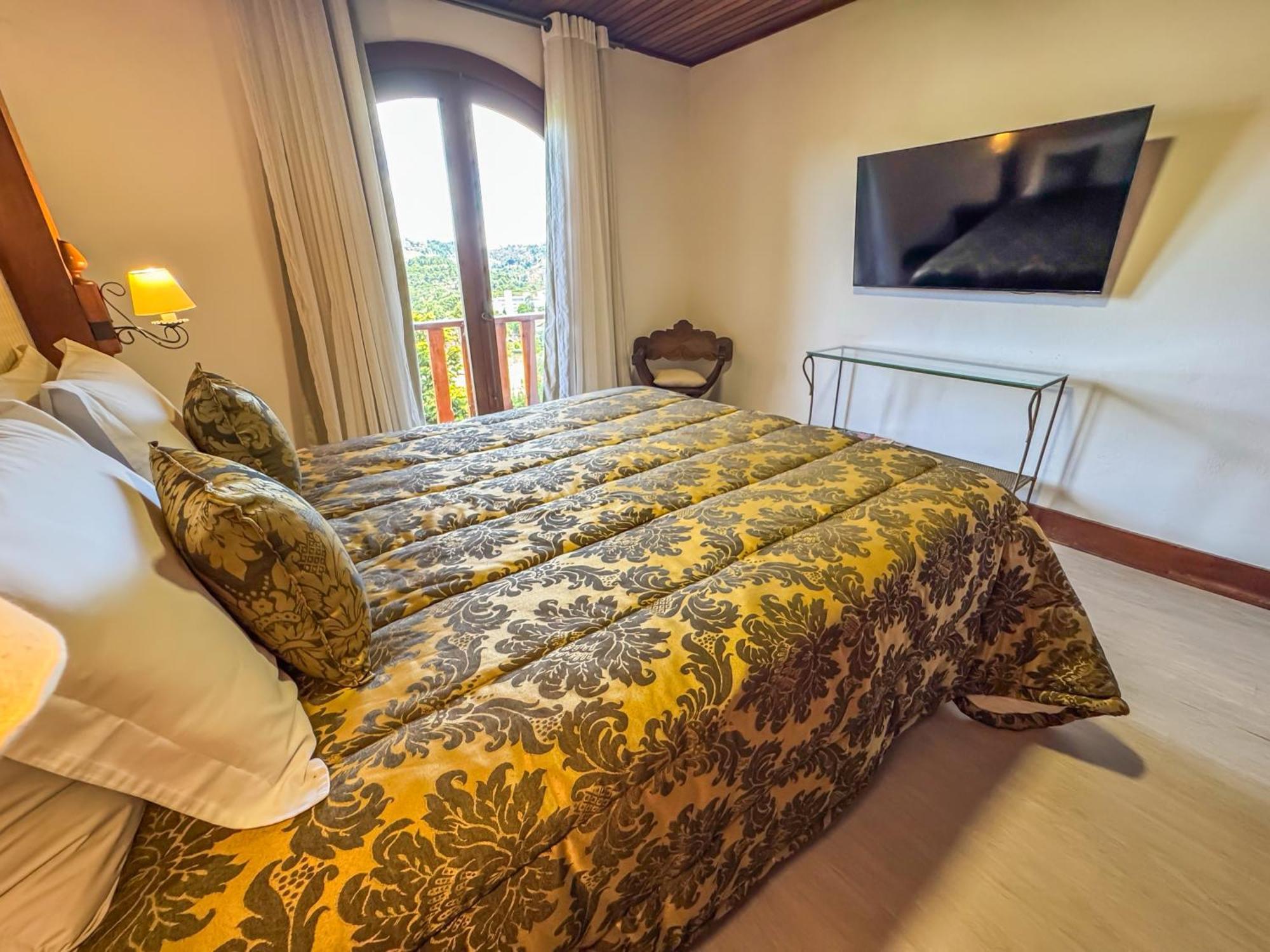 Mansao Nacional Inn Кампус-ду-Жордау Экстерьер фото